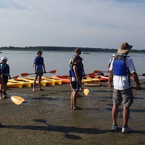 A group of kayakers prepares to embark on a tour in Myrtle Beach, SC