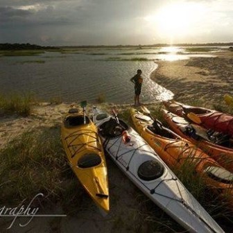 Kayaks parked along shore of Black River in Myrtle Beach, SC