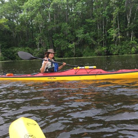 A kayaker posing while paddling Black River in Myrtle Beach, SC