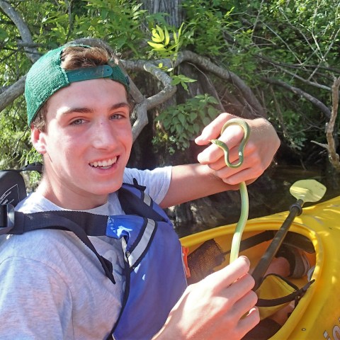 Kayaker with Rough Green Snake
